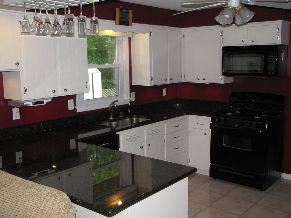 Kitchen - Lots of Granite and lighting