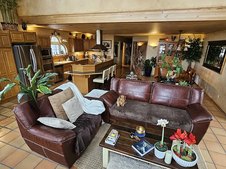 Another view of Great room, dining room, kitchen, down the hallway at the end is the Master Suite for privacy