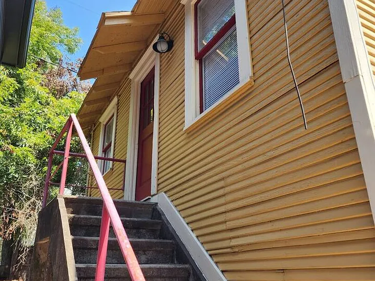 E 11th 1/2 St — Photo 22