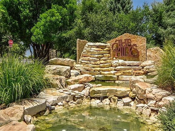 Located in prestigious The Hills of Lakeway, gated and guarded.