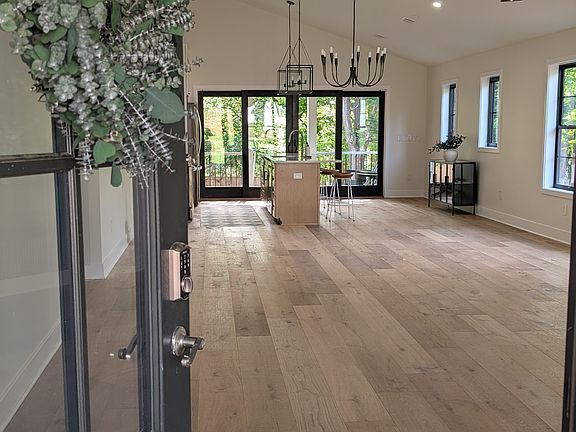 Open concept living room, dining room, and kitchen