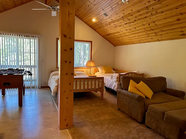 Bonus room with additional beds and game table