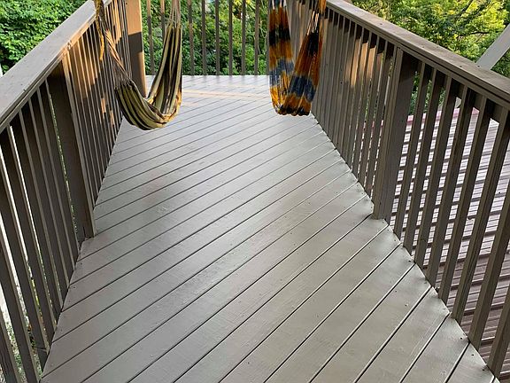 Lower Level Deck (Attached to Kitchen) - Hammocks not included; currently installed hammock hooks are ready for your hammocks! Many days and nights were enjoyed lounging around, here! It is shaded by the upper level deck.