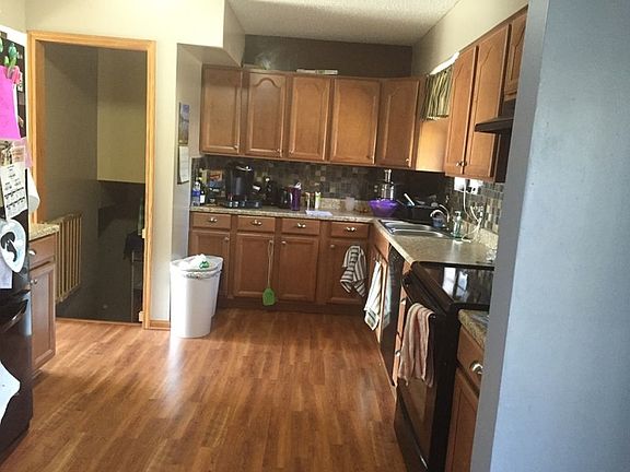 Kitchen w/stairs to garage and basement
