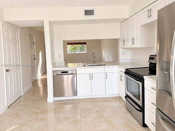 4th image of 14902 SW 82nd Ln #13-207