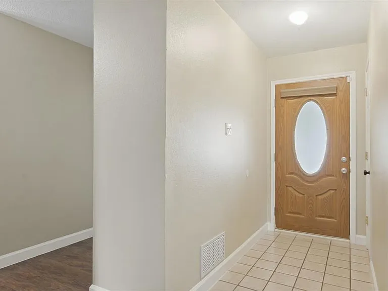 heading back toward the bedrooms to the left