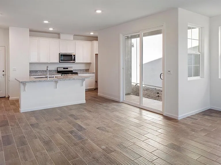 Kitchen and access door to Side yard