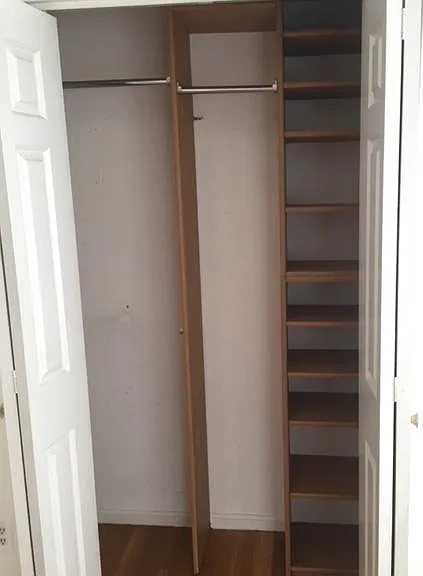 1 of 3 closets in master bedroom.