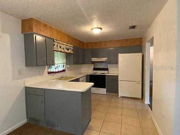 5th image of 100 NE 50th Ct