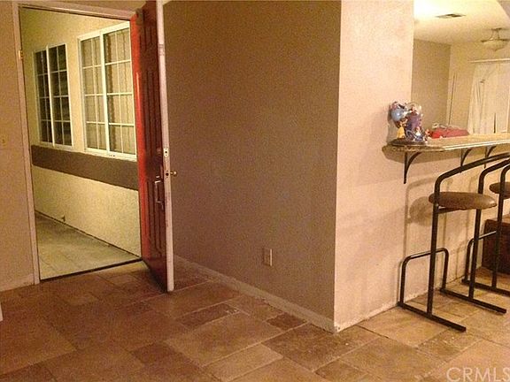 Front Door, travertine floors in traffic ares