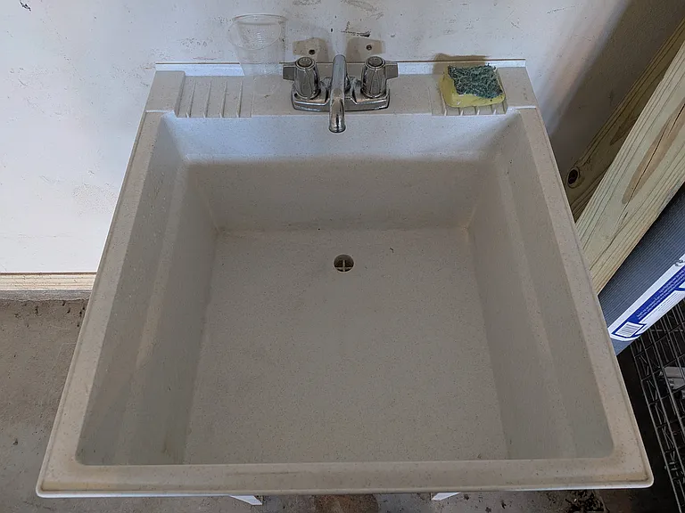Utility tub in garage.