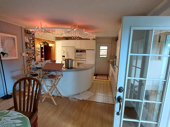 Spacious open floor plan for cooking, and relaxing at table or living room.
