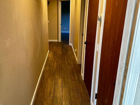 Hallway to bedrooms and bathrooms