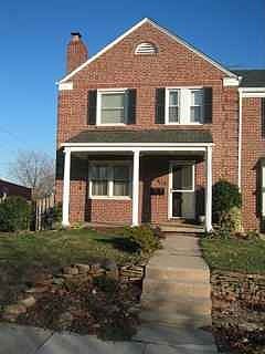 Front of home, large fenced end lot