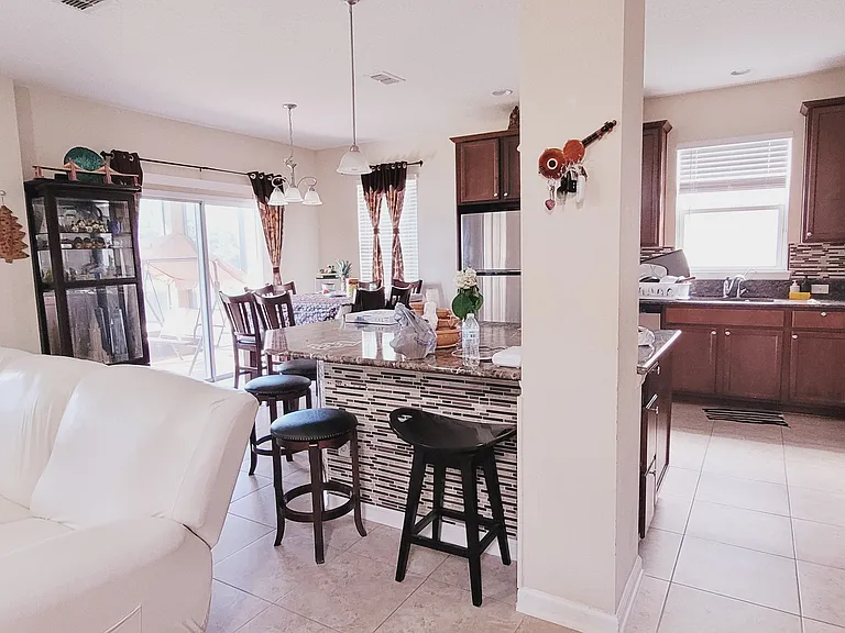 Sample View of Living and Kitchen rooms of how it will look when you setup with furniture.
