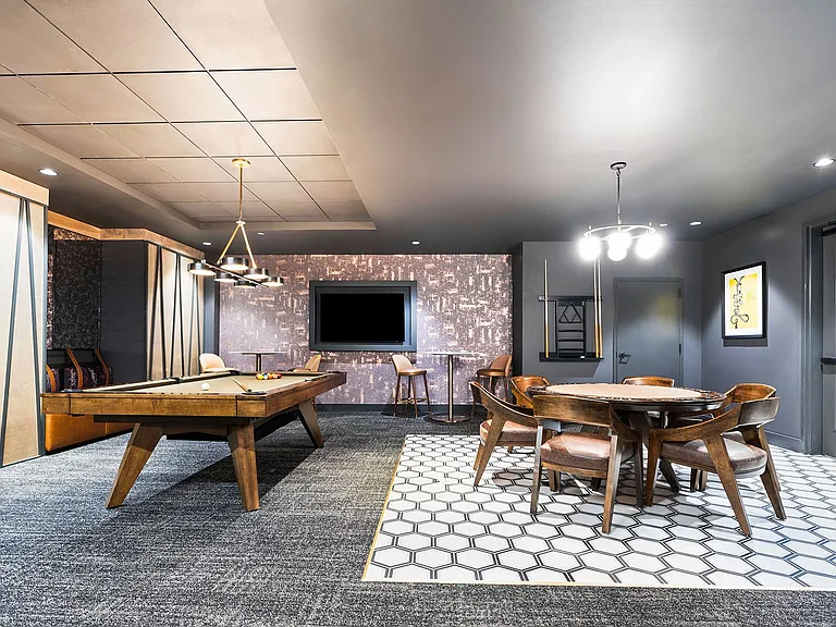 Easily entertain at the Speakeasy bar with billiards and poker table