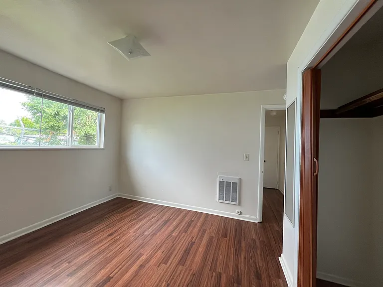 second bedroom with big east facing window