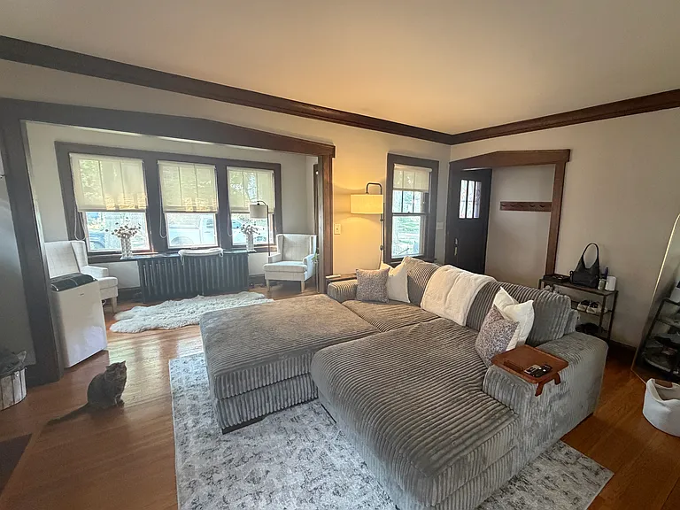 Living room view toward front door