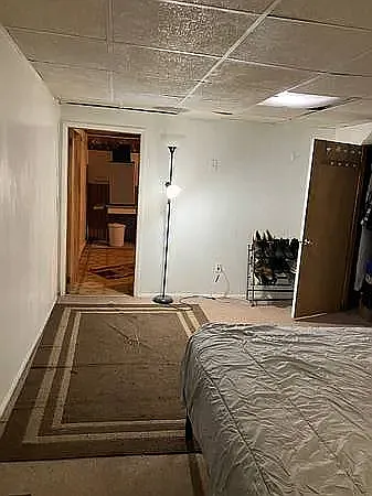 Half of bedroom w rug and closet
Clean, quiet, simple Place