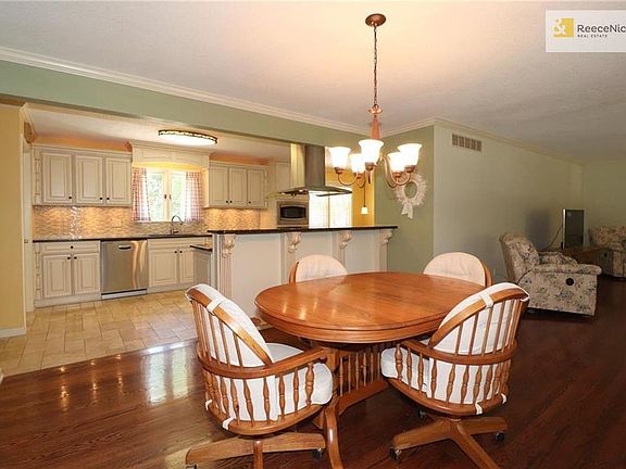 Dining area OPEN to lovely remodeled KITCHEN!