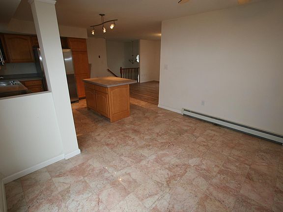 Marble Floor Dining Room with Sliding Glass doors to Rear De