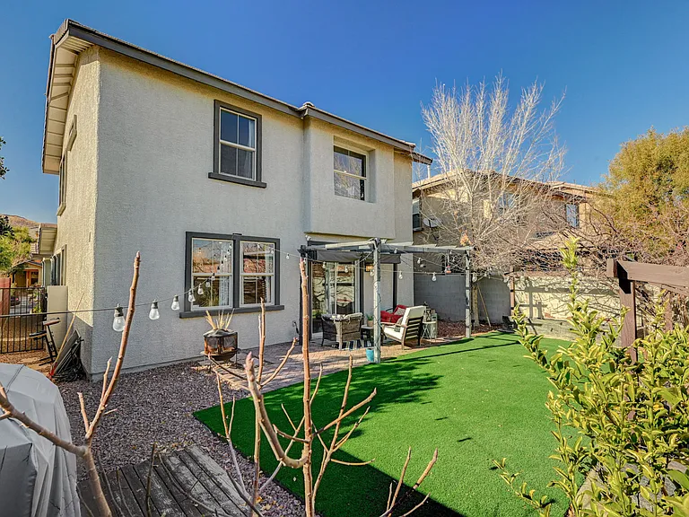Spacious Backyard with no neighbors behind. Turf grass and gazebo