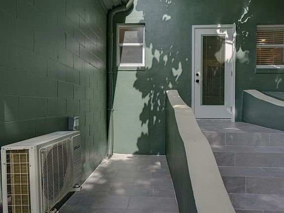 BBQ area next to the back Kitchen door.