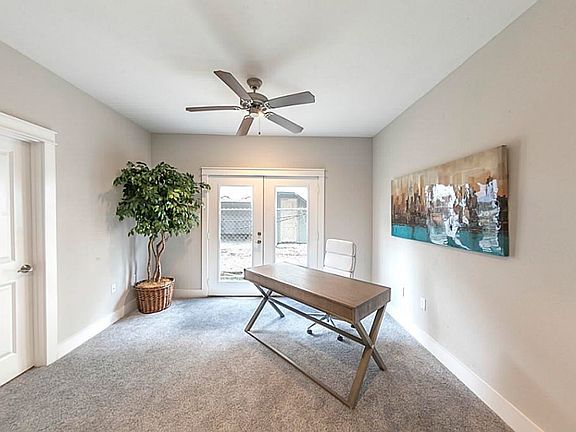 First floor bedroom  with full bath and walk in closet with built in shelves! Also great for an office!