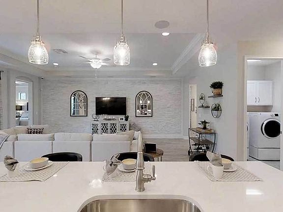 Sandalwood model home open floor plan view from kitchen sink William Ryan Homes Tampa