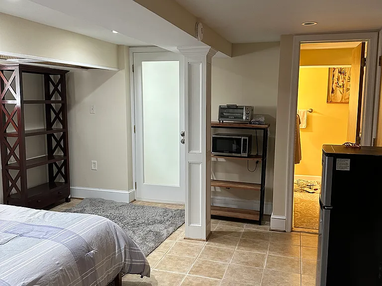 Small microwave, toaster oven and refrigerator.
