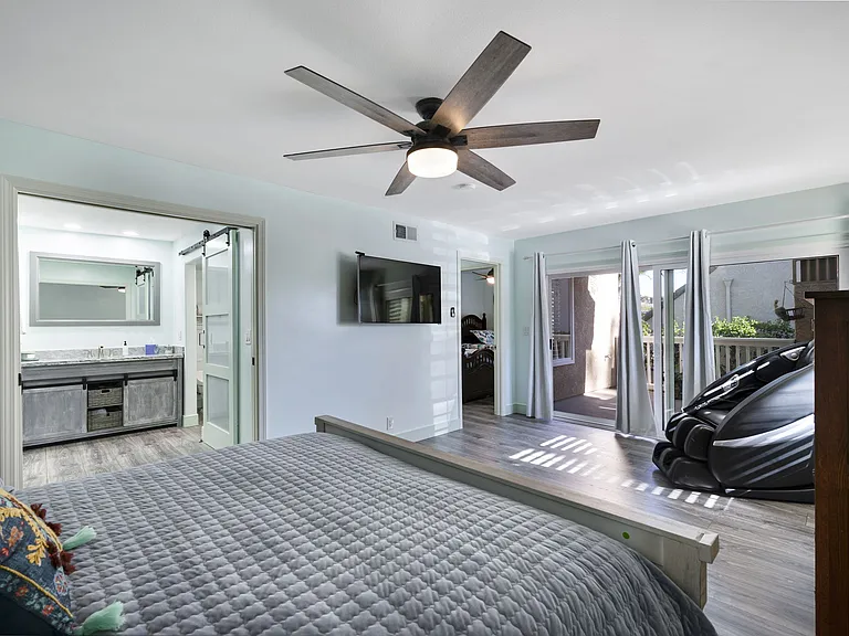 Master bedroom with balcony access
