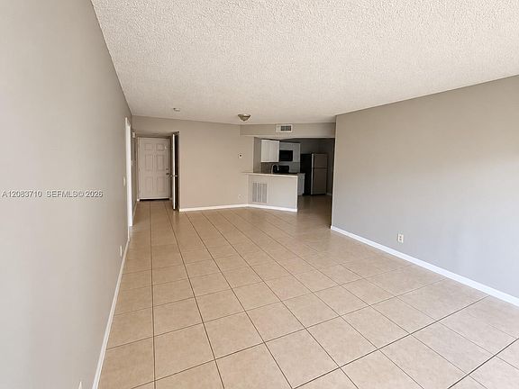 5th image of 8821 Wiles Rd APT 102