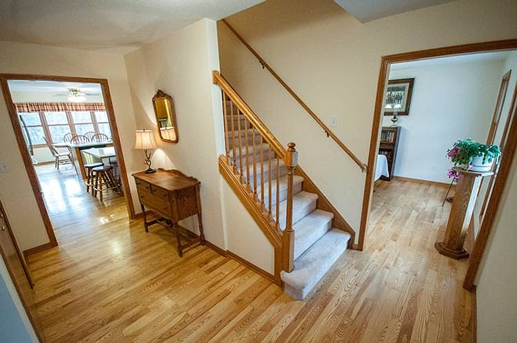 Guests and family members enter the home and a sense of hospitality greets them.  The sparkling wood floors run from the entry though the formal dining and kitchen area.