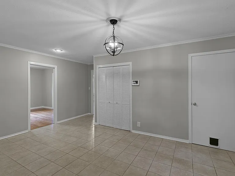 Door to good sized laundry room