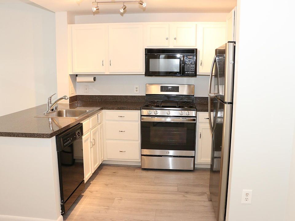 Kitchen from entrance/bathroom.