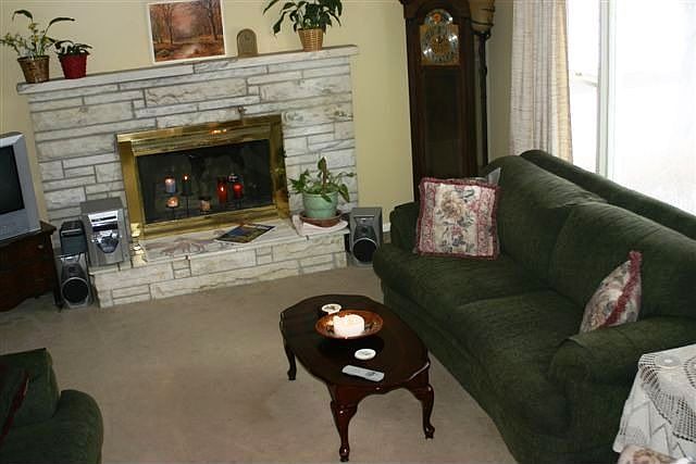 beautiful white stone fireplace