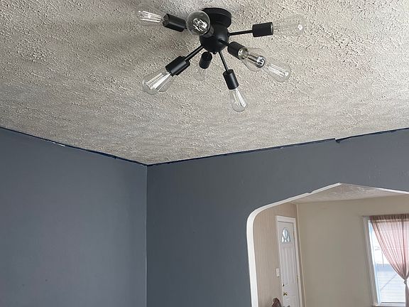 New light fixture in the dining room. 10yr light bulbs