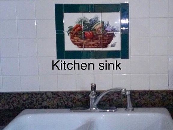 Kitchen sink with wooden cab
