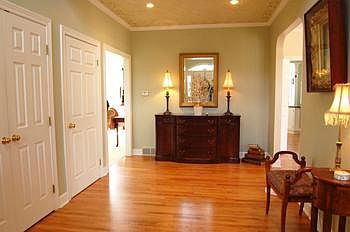 This foyer says welcome to all of your guests.  Spacious with wood flooring and large closet it begins the tour of this beautiful and inviting home.