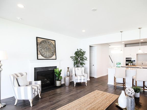 Sit back and relax in the spacious Great Room - Model Representation