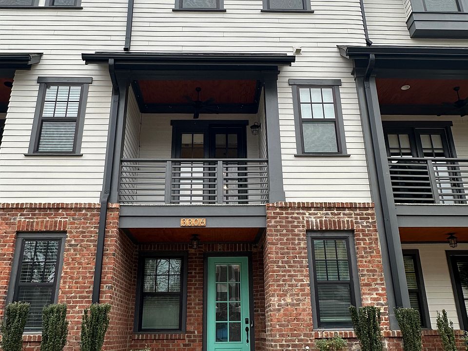 Front of townhome with blue door