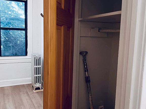 Closet between bedroom and bathroom