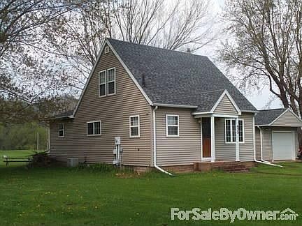Front left angle
						:
						This photo shows the newly shingled roof and the attached single car garage