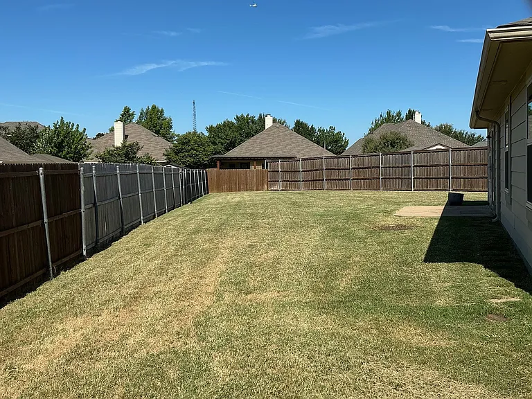 Large back yard with open patio