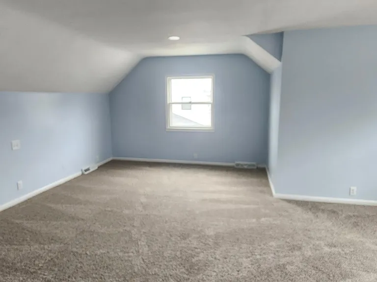 main bedroom. lots of light, space, new carpet, walk in closet, full renovated bathroom