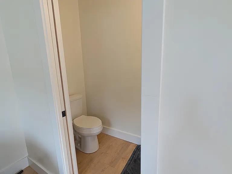 Half bath off dining area with pocket door