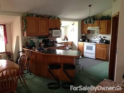 from dining rm toward kitchen