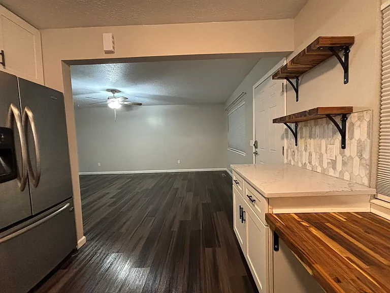 Additional counter space, perfect for coffee bar with shelving for decor!