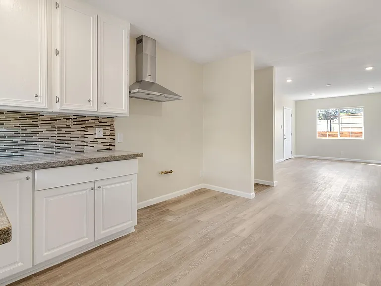 Kitchen, laundry area, living room