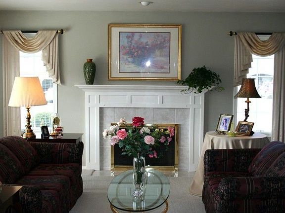 Formal living room with lovely fireplace